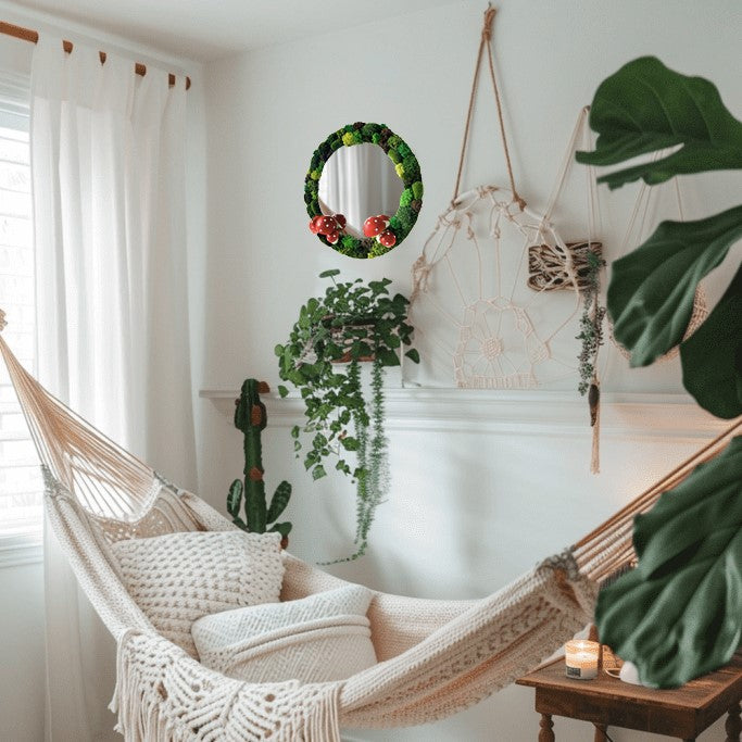Boho style bedroom with hammock and greenery – decorative mirror with preserved moss and mushrooms