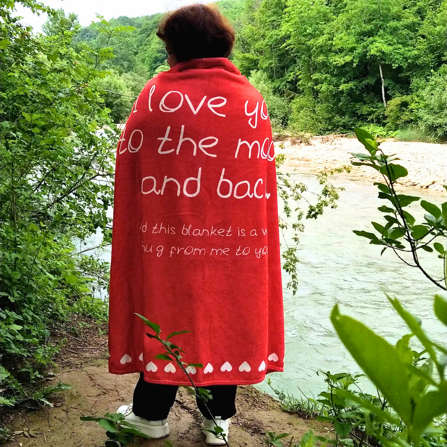 I love you to the moon and back blanket on a woman