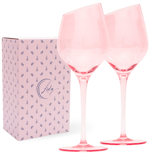 These pink slanted rim wine glasses are a must-have for any wine enthusiast who appreciates unique design