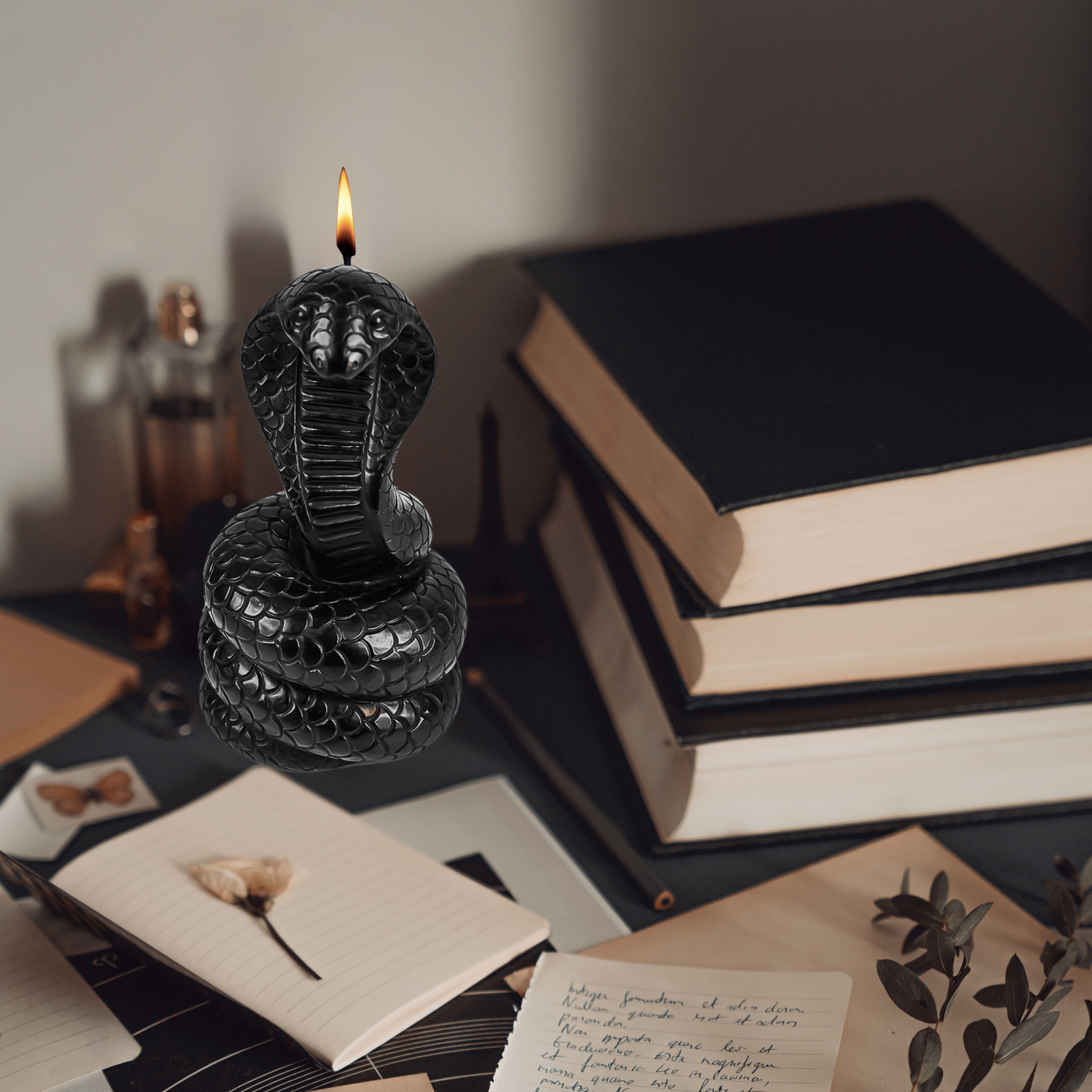 Black snake candle in gothic room with goth decor – horror gifts, black candles, spooky decor