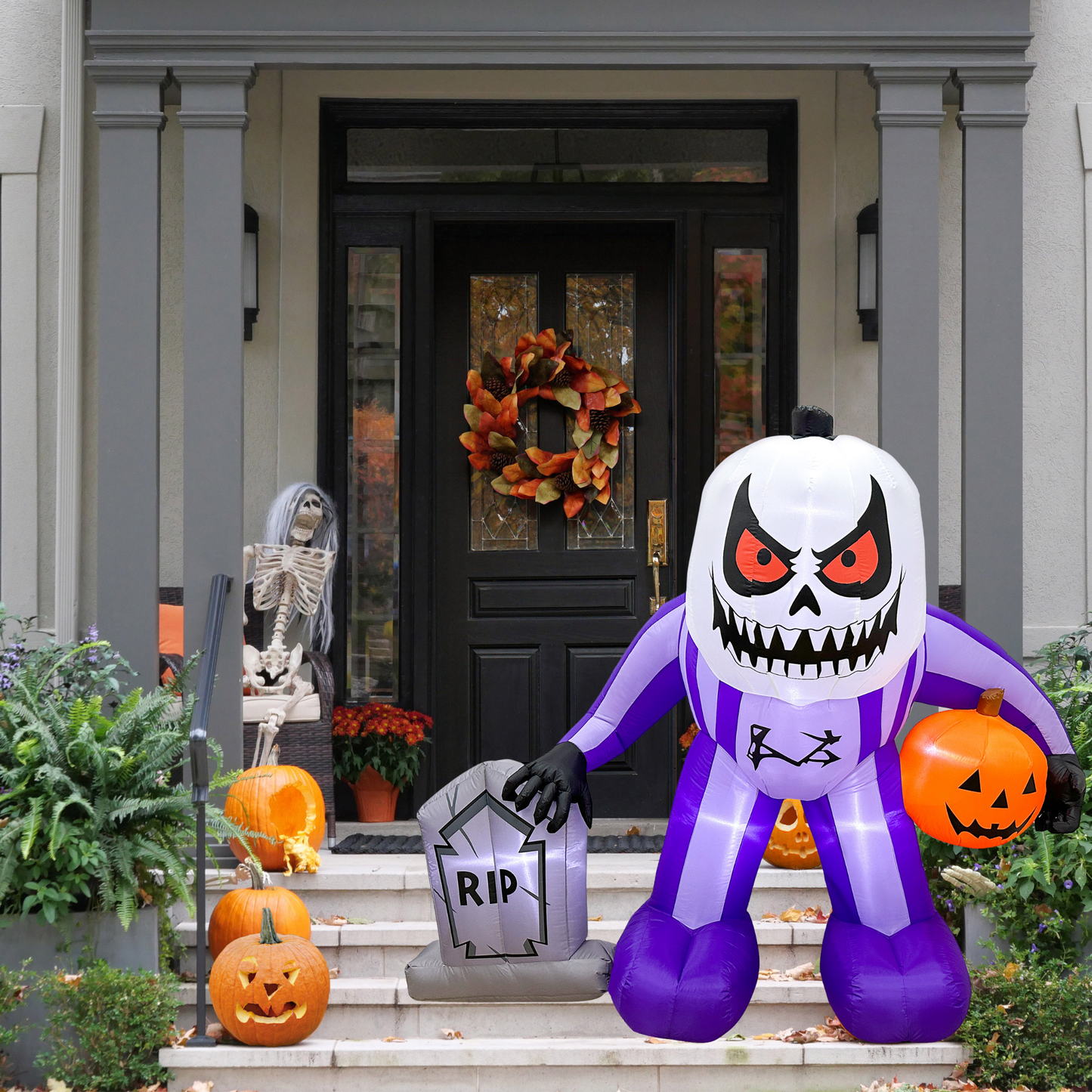 Mystic Moon Jack on front porch in daylight, part of outdoor Halloween yard decor setup