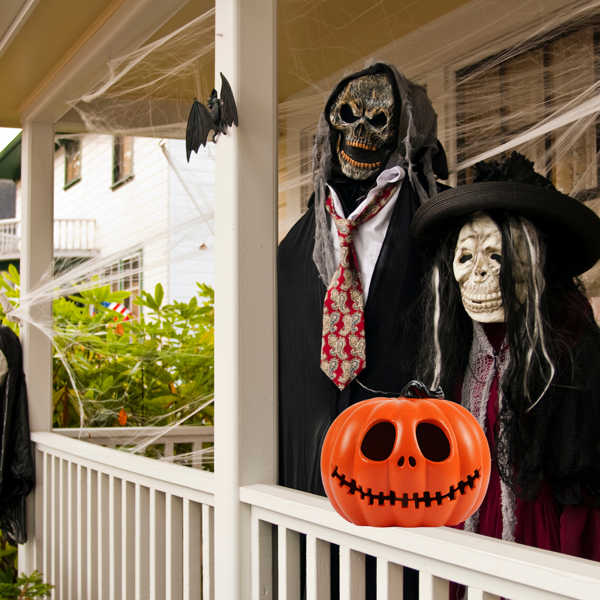 jack o lantern pumpkins with other outdoor halloween decor
