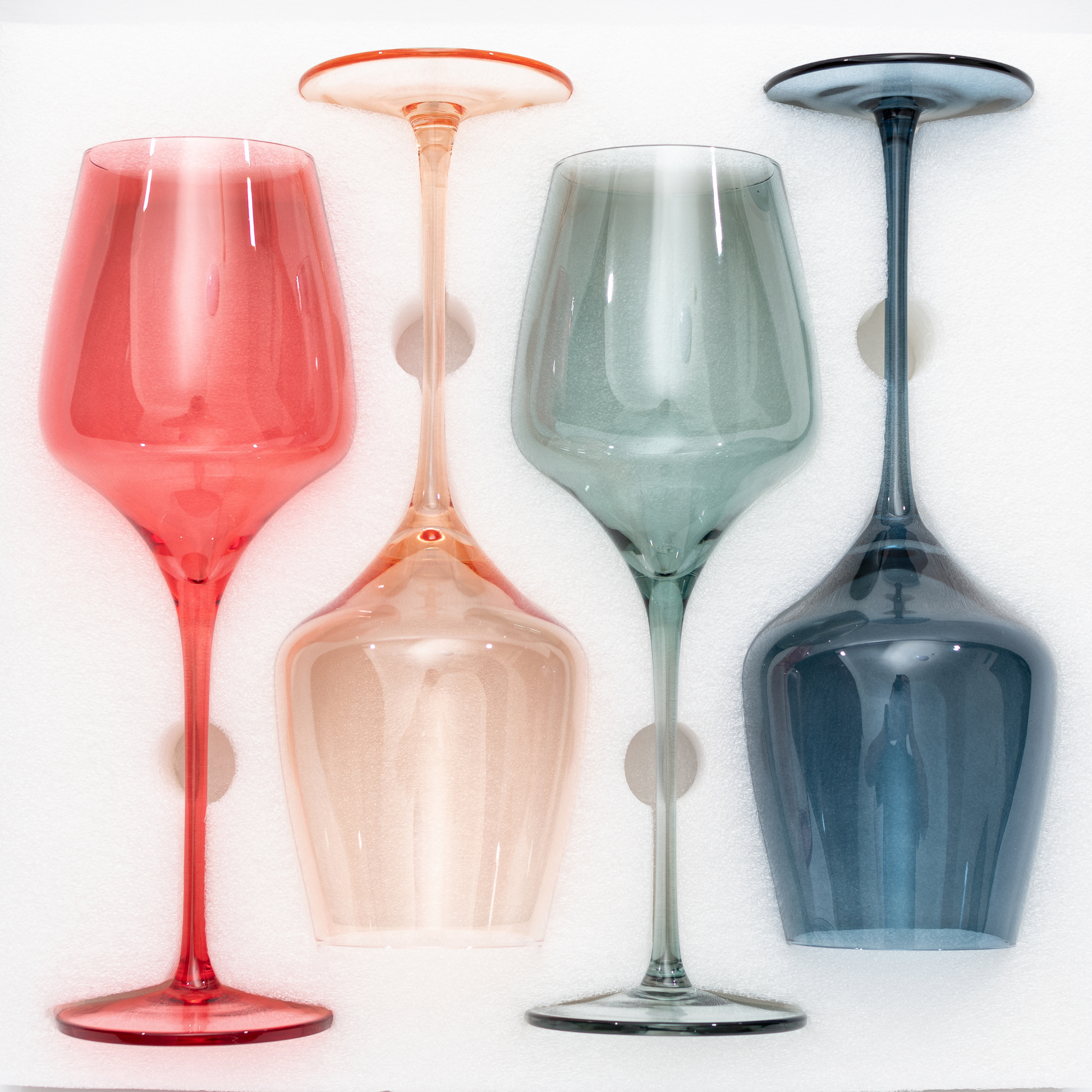 Luxury collection of four colored wine glasses, ideal for modern table settings