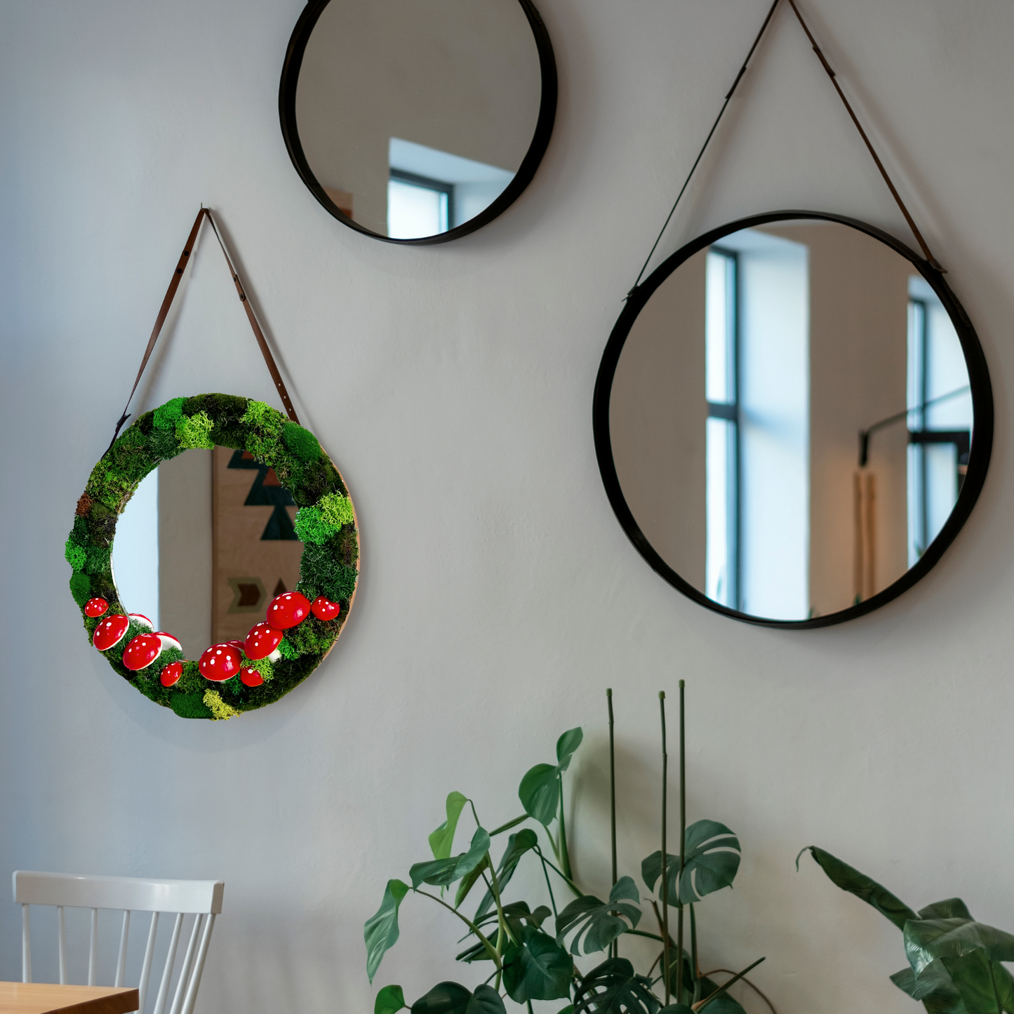 Moss mirror styled with two minimalist wall mirrors – perfect green mirror for bedroom decor