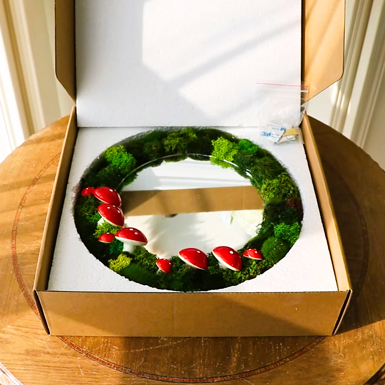 Moss and mushroom mirror inside an open fairy-themed gift box – ready for gifting